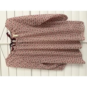 Matilda Jane Chelsea top in pink with a floral print and a ribbon tie closure.